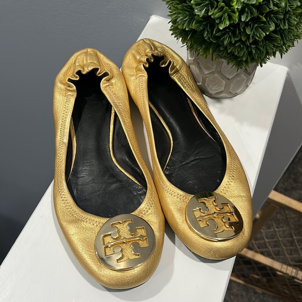 Tory Burch gold flats